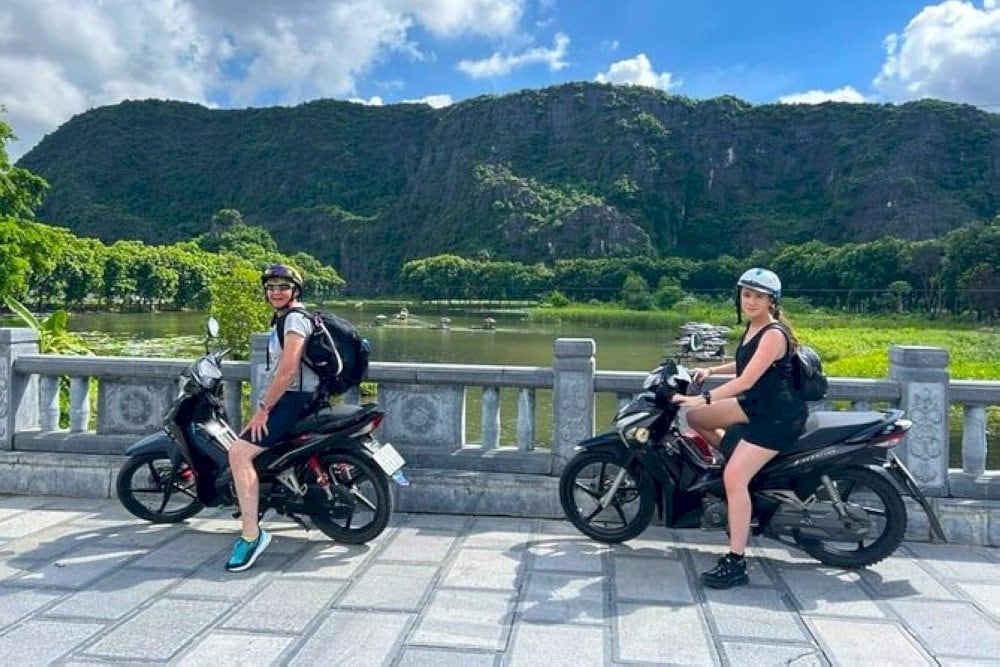 Traveling to Hoa Lu Ancient Capital by motorbike allows tourists to fully explore the area at their own pace